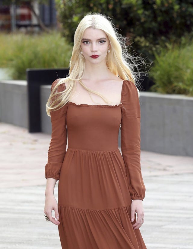 r/AnyaTaylorJoy - I love this shoot, her pale skin and blonde hair contrast so well with her lipstick and dress