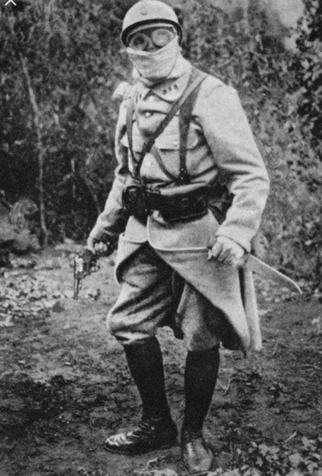 A “Trench Raider” during WW1. Both sides had them and they were sent in  small groups where they snuck into forward enemy trenches and killed  everyone. Armed with a revolver, several knives,