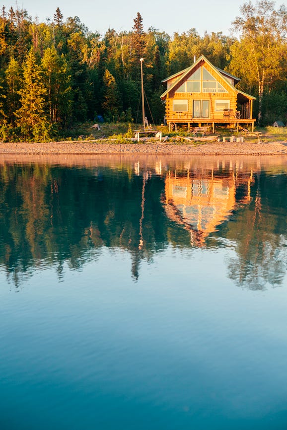 a cabin on a lake