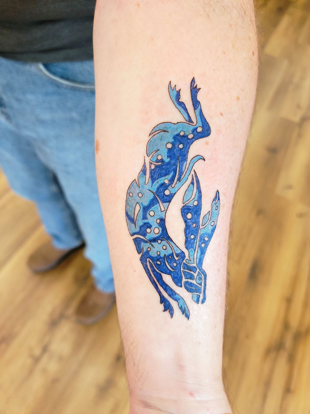 Hank Shaw's jackrabbit tattoo.