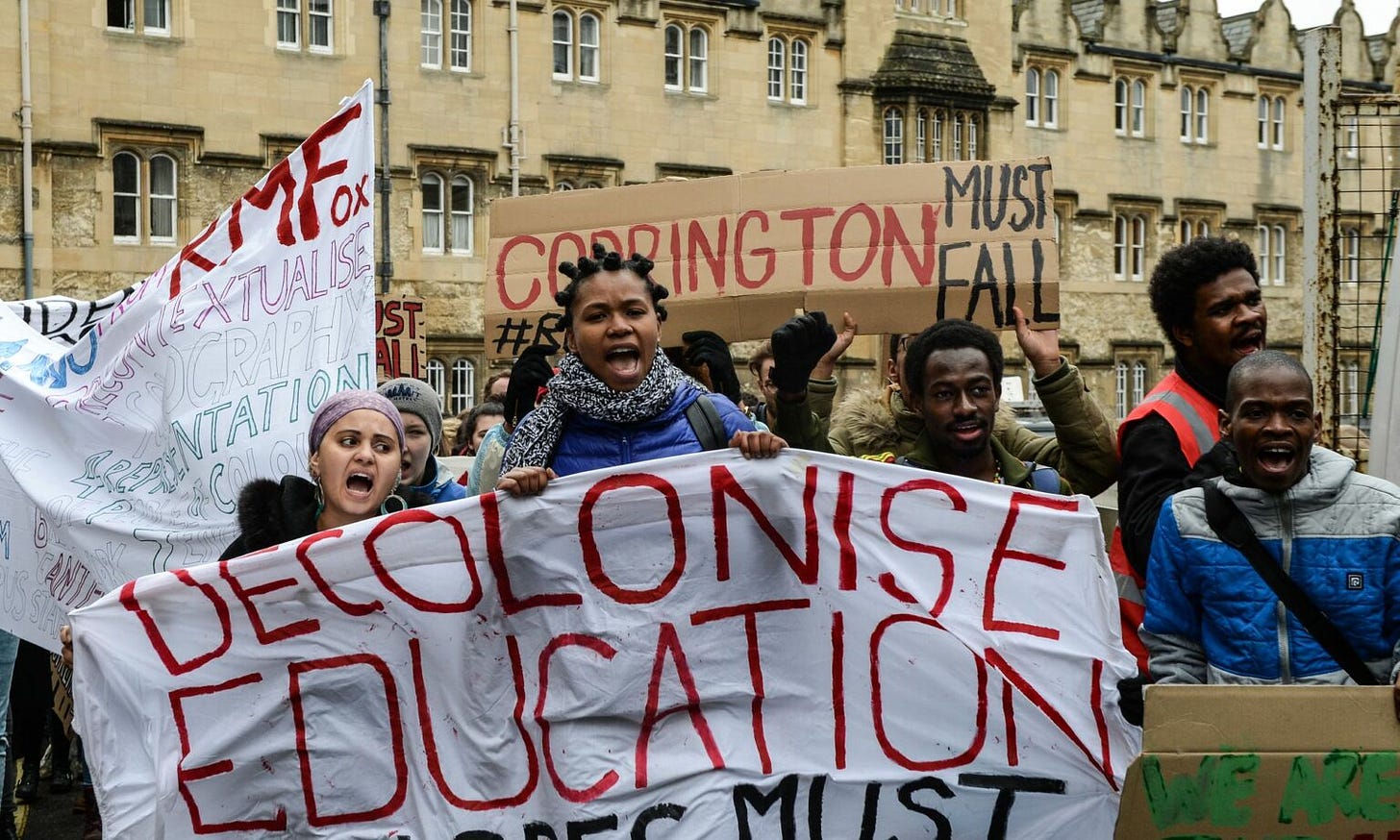 Students demonstrate outside Oxford University's Oriel College for the removal of the Cecil Rhodes statue on March 9, 2016.