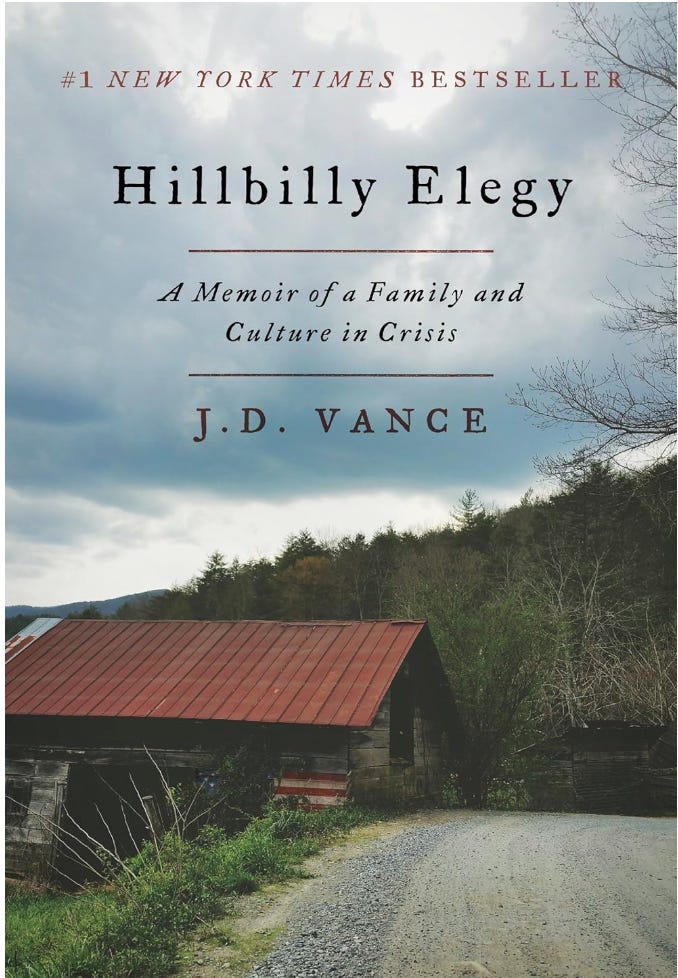 The goddamned cover of goddamned Hillbilly Elegy, featuring  a gray sky, and pines, and a bend in a gravel road.