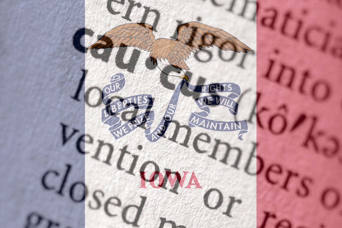 Iowa state flag superimposed over definition of the word "caucus."