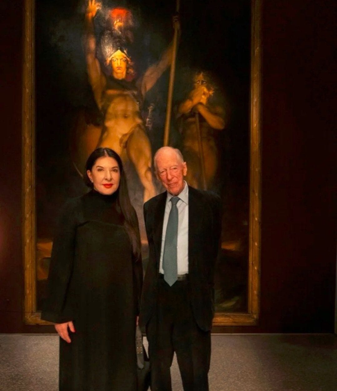 Oli London on Twitter: "True evil exists in this world. Marina Abramovic  with Jacob Rothschild standing in front of the painting “Satan Summoning  His Legions”. Marina is an artist specialising in Human