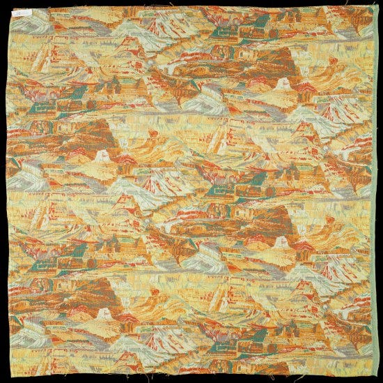 Silk with a pattern of the Grand Canyon. Bright orange, green, white and reds mimick the crags and dimensions of the famous natural canyon. The pattern goes in every direction to suggest rather than depict the Grand Canyon