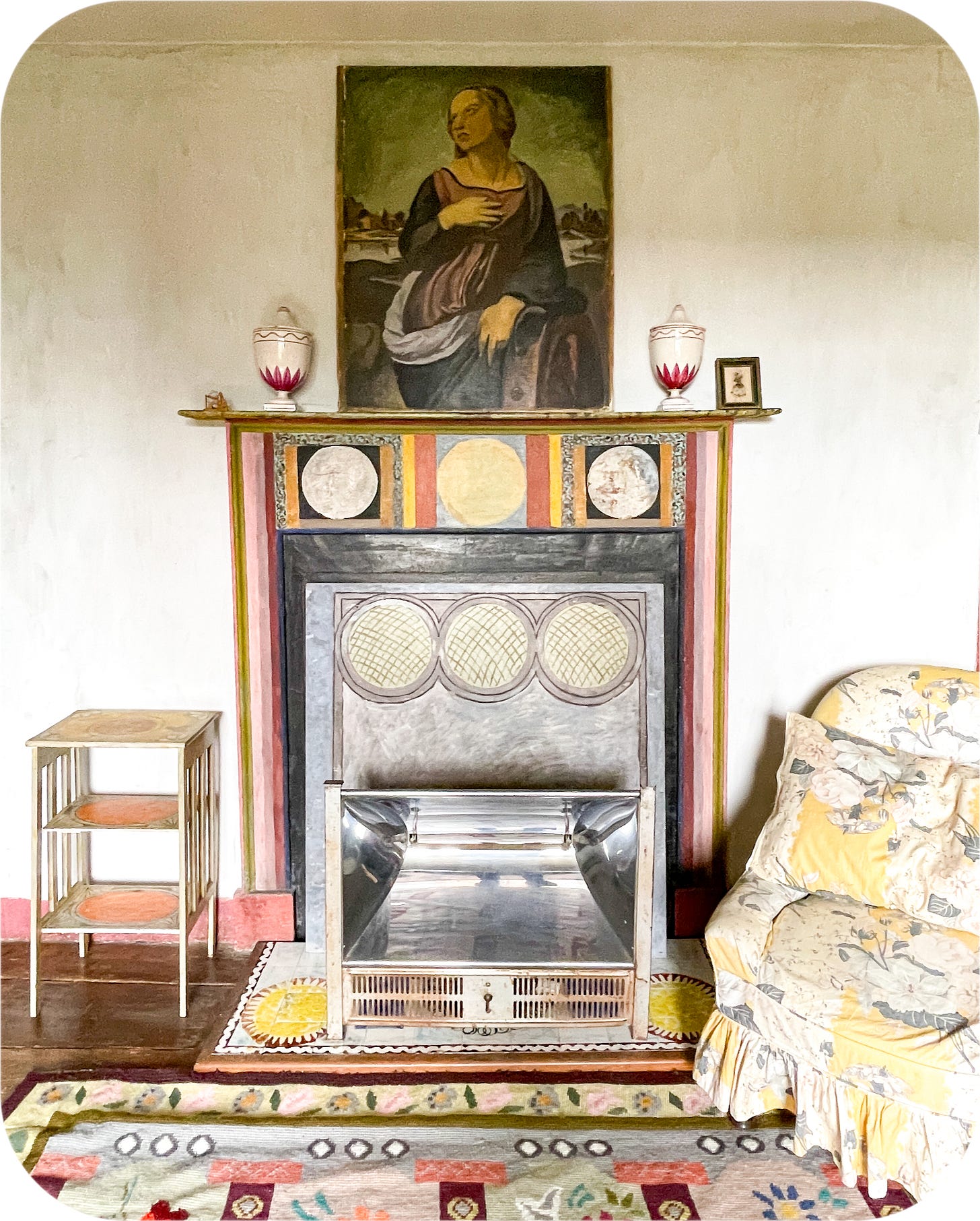 A fireplace at Charlston Farmhouse