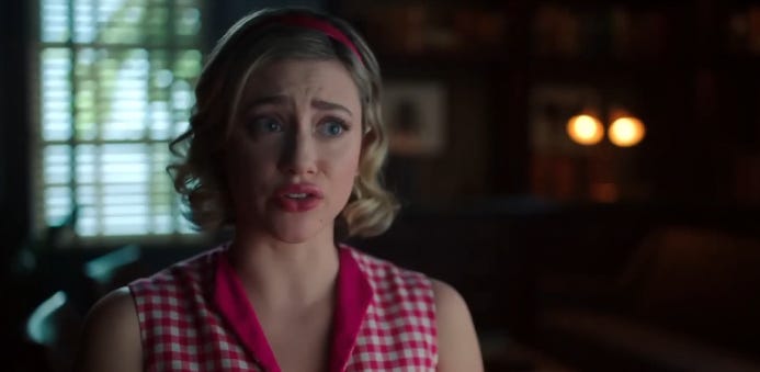 Betty Cooper in a pink checkered dress.