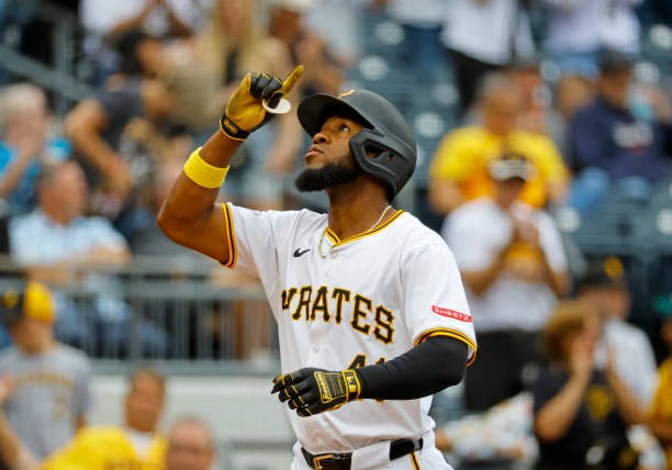 Bryan De La Cruz of the Pittsburgh Pirates reacts after hitting a two run home run in the seventh inning against the Milwaukee Brewers at PNC Park on...