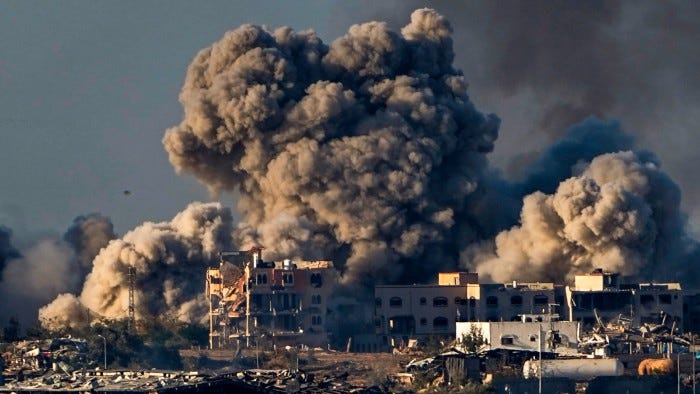 Smoke rising after Israel bombs an area in the Gaza Strip on December 16 2023