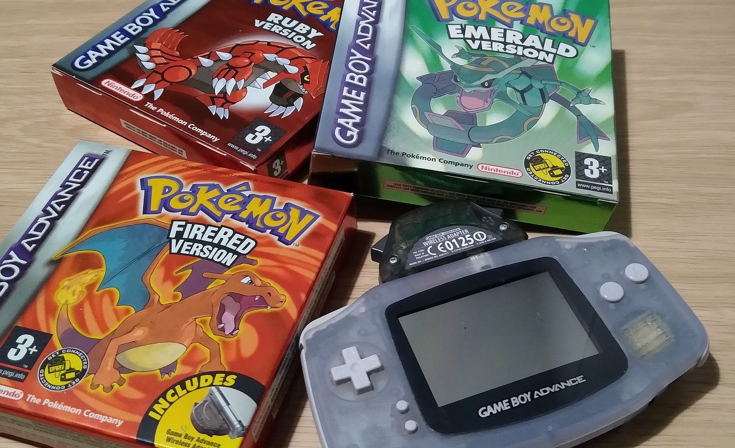 A selection of Game Boy Advance games, and console with Wireless Adapter