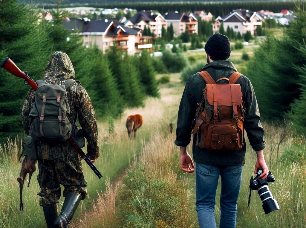 A hunter and photographer walking on trail with condominiums in distance