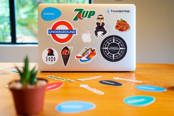 a laptop with a lot of brands on it