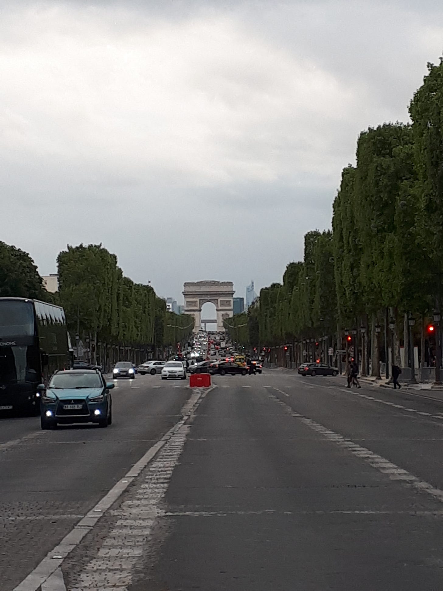 Champs d'Elysee with the Arc De Triomphe in the background.