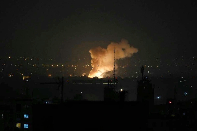 Smoke rises after an explosion in Tehran, Iran, Friday, June 13, 2025, as Israel attacked Iran's capital.