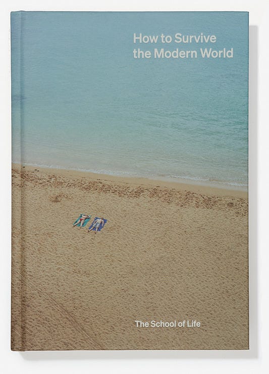 Image of the book How to Survive the Modern World by The School of Life. Book cover is an aerial photo by Richard Misrach ofof two people on an otherwise empty beach