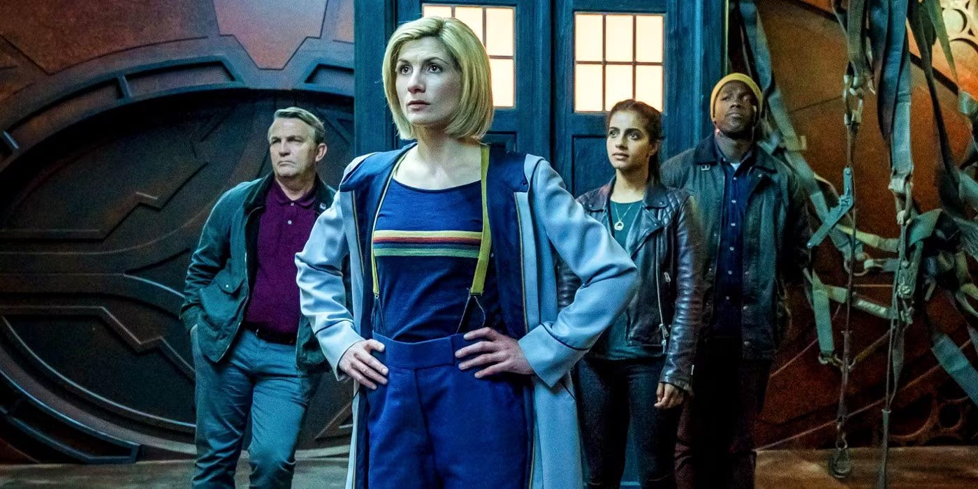 This image shows Team TARDIS standing around the TARDIS, which has materialized inside a spacecraft crashed on the surface of the planet Ranskoor Av Kolos in "The Battle of Ranskoor Av Kolos" (Doctor Who Series 11's tenth episode and season finale). From left to right: Graham O'Brien (played by Bradley Walsh, leaning against the TARDIS), the Thirteenth Doctor (played by Jodie Whittaker), Yasmin "Yaz" Khan (played by Mandip Gill), and Ryan Sinclair (played by Tosin Cole). This image shows Team TARDIS standing around the TARDIS, which has materialized inside a spacecraft crashed on the surface of the planet Ranskoor Av Kolos in "The Battle of Ranskoor Av Kolos" (Doctor Who Series 11's tenth episode and season finale). From left to right: Graham O'Brien (played by Bradley Walsh, leaning against the TARDIS), the Thirteenth Doctor (played by Jodie Whittaker), Yasmin "Yaz" Khan (played by Mandip Gill), and Ryan Sinclair (played by Tosin Cole).