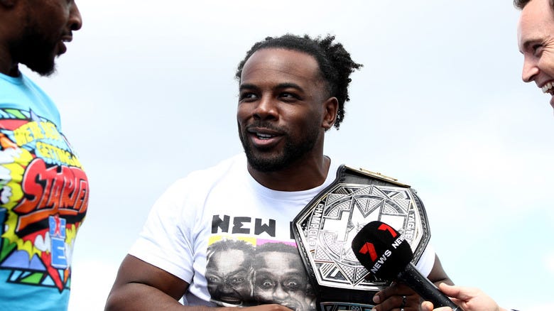 Xavier Woods with the NXT Tag Team Title