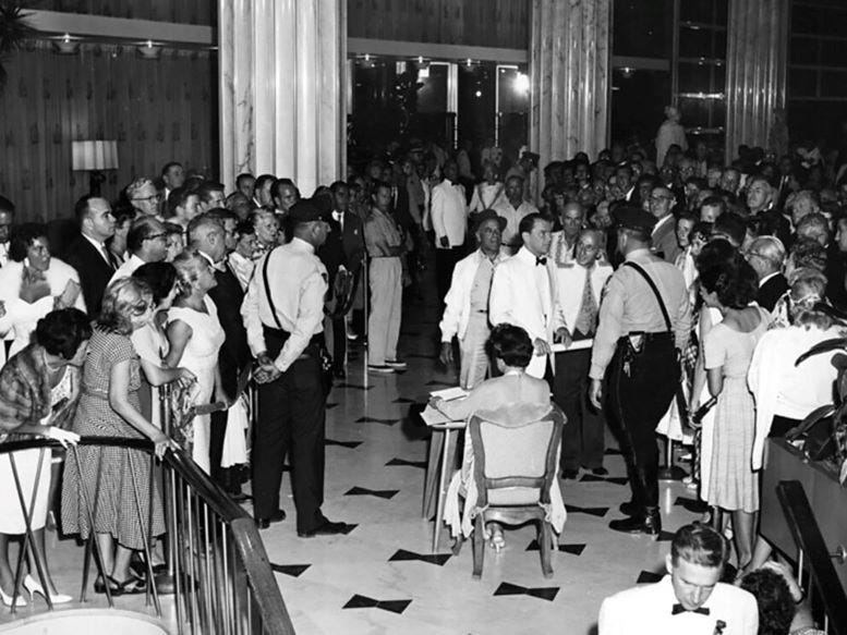 Cover: Frank Sinatra in the lobby of the Fontainebleau Hotel.