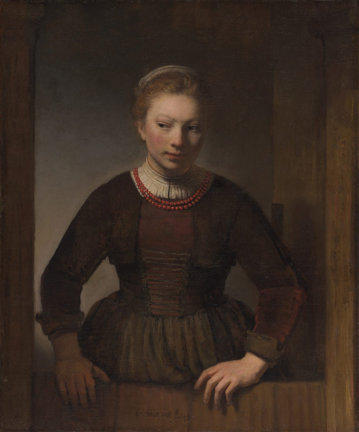 Young woman at half-door