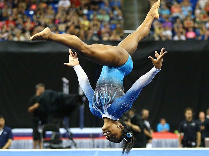 Image may contain Human Person Sport Sports Athlete Gymnastics Acrobatic and Gymnast