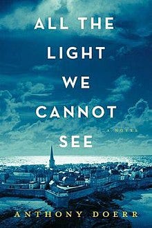 Book cover with the title displayed in white over the sky stretched throughout the top and middle of the cover. Underneath the title is an overhead view of the city, Saint-Malo, with a blue overlay.