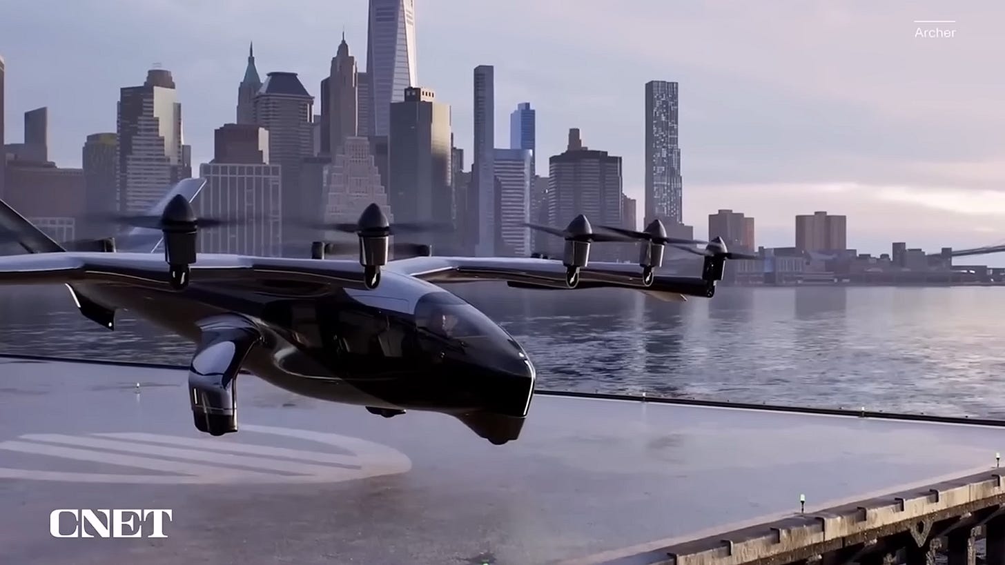 Archer Midnight eVTOL aircraft flying over a cityscape