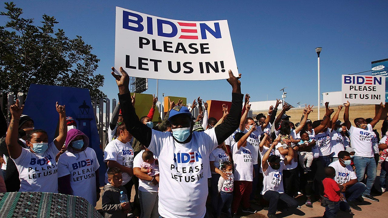 Migrants wear Biden T-shirts at US-Mexico border, demand clearer ...