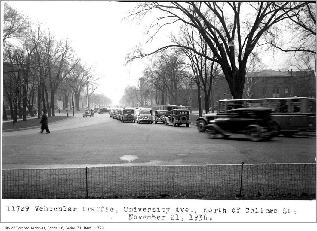 A 1936 archive photo of University Avenue north of College Street, showing bumper to bumper car traffic (and no bike lanes)