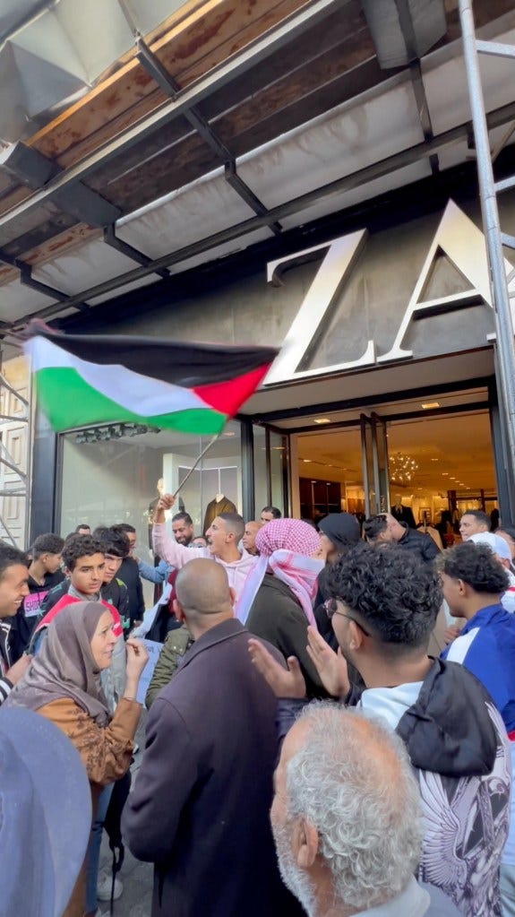 Protesters waving Palestinian flags have expressed anger at Zara.