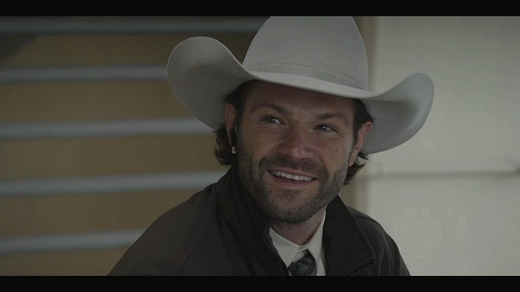 Jared Padalecki smiling weird on Walker set.