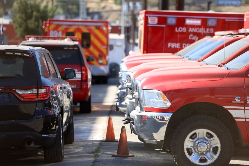 Fire fighting trucks parked and awaiting repair