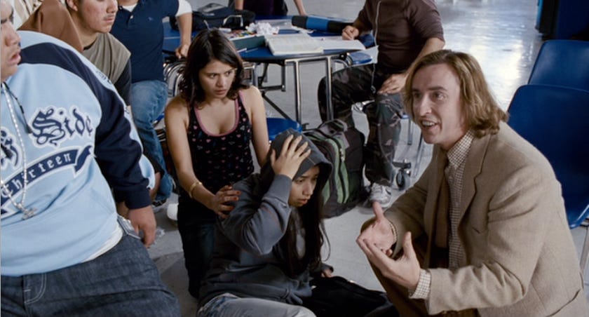 From Hamlet 2: Steve Coogan kneels next to students in a cafeteria turned classroom, explaining what theater is all about?