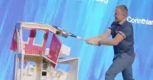 Pastor wrecks Barbie Dream House with Bible taped to baseball bat