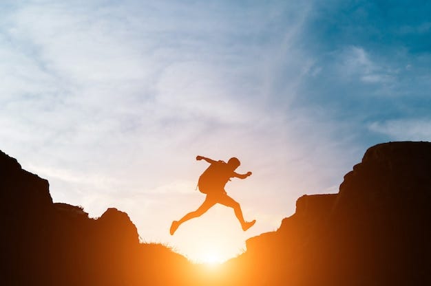 Free photo man jump through gaps between hills