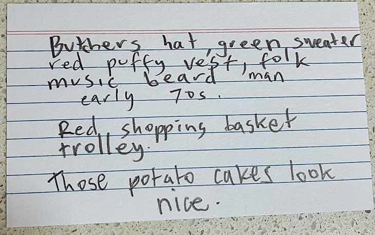 Butcher's hat, green sweater, red puffy vest, folk music, beard man, early 70s, red chopping basket trolley. These potato cakes look nice. 