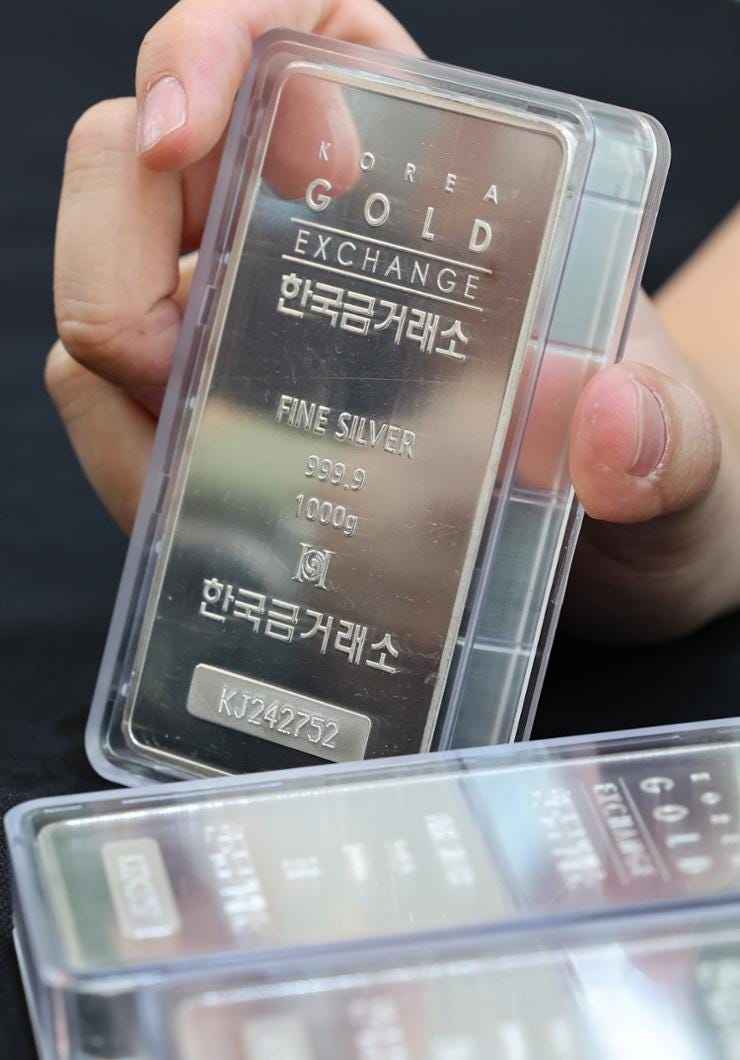 An official displays silver bars at the Korea Gold Exchange in central Seoul, Sept. 19. Newsis