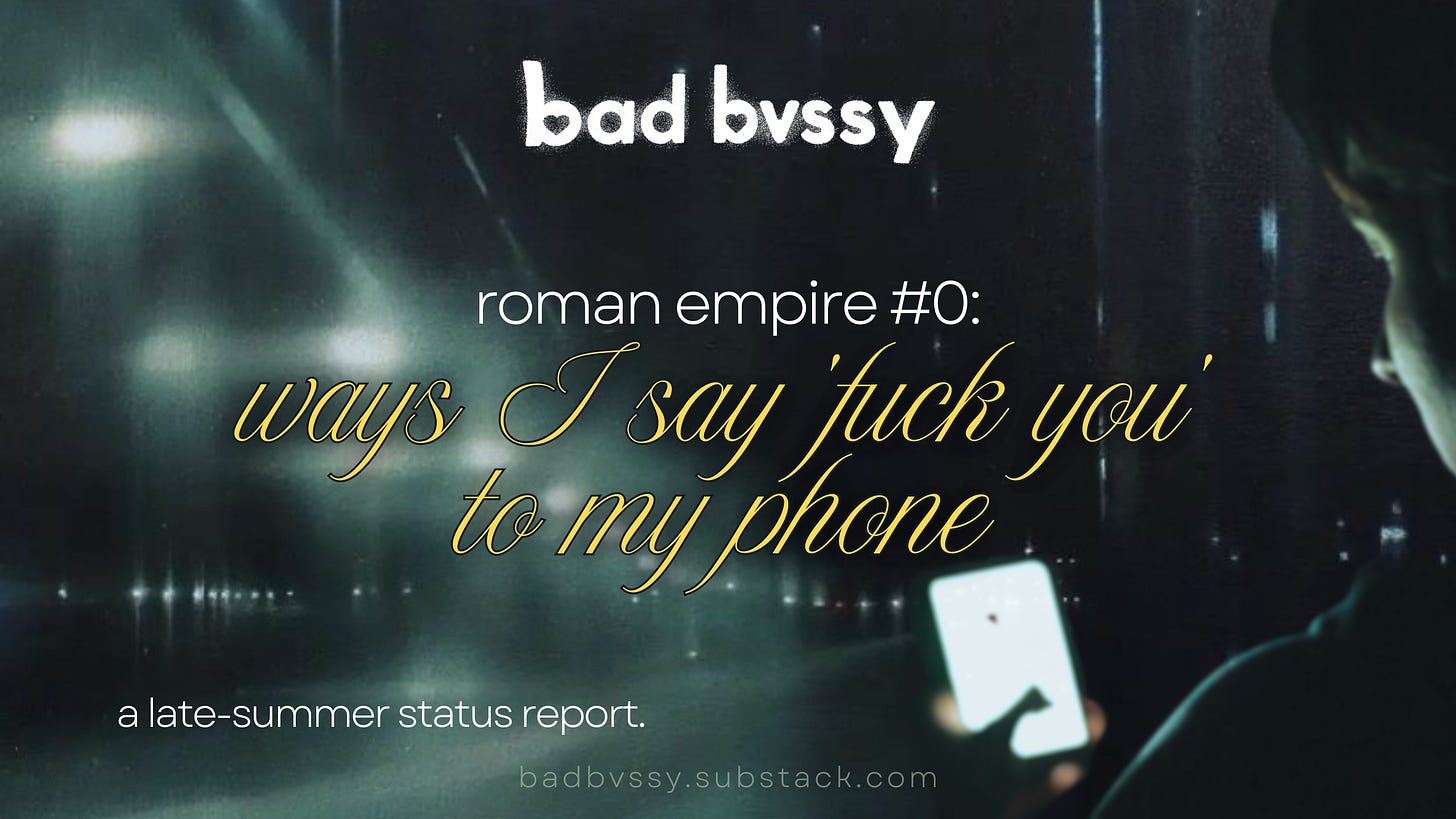 A human looks at their phone in a moody nighttime city atmosphere. From bad bussy. Roman Empire, Post #0: Ways I say 'Eff you' to my phone. A late-summer status report.