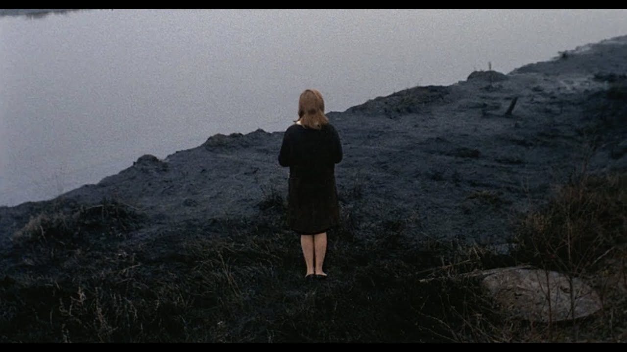 Red Desert (1964) by Michelangelo Antonioni, Clip: Monica Vitti stand in a  polluted landscape...