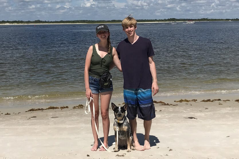 Enjoying Smyrna Dunes calm dog-friendly inlet beach with our blue heeler, Scout