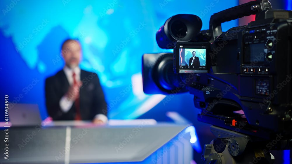 Professional TV Camera Standing in Live News Studio with Anchor seen in  Small Display. Unfocused TV Broadcasting Channel with Presenter, Newscaster  Talking. Mock-up Television Channel Newsroom Set Stock Photo | Adobe Stock