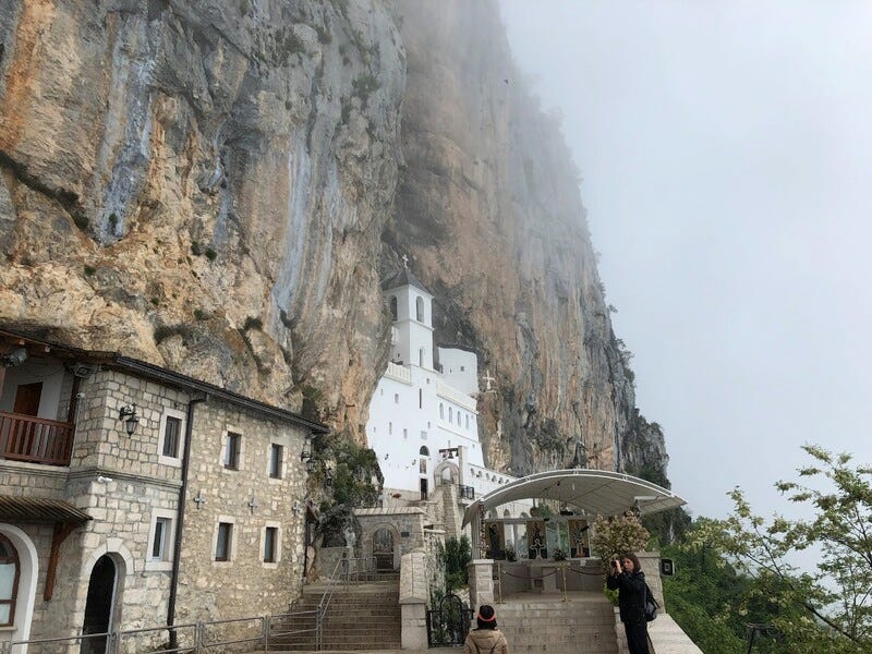 The Upper Ostrog Monastery in Glava Zete (Montenegro) is built high up a foggy mountain and very difficult to get to... The Upper Ostrog Monastery in Glava Zete (Montenegro) is built high up a foggy mountain and very difficult to get to...