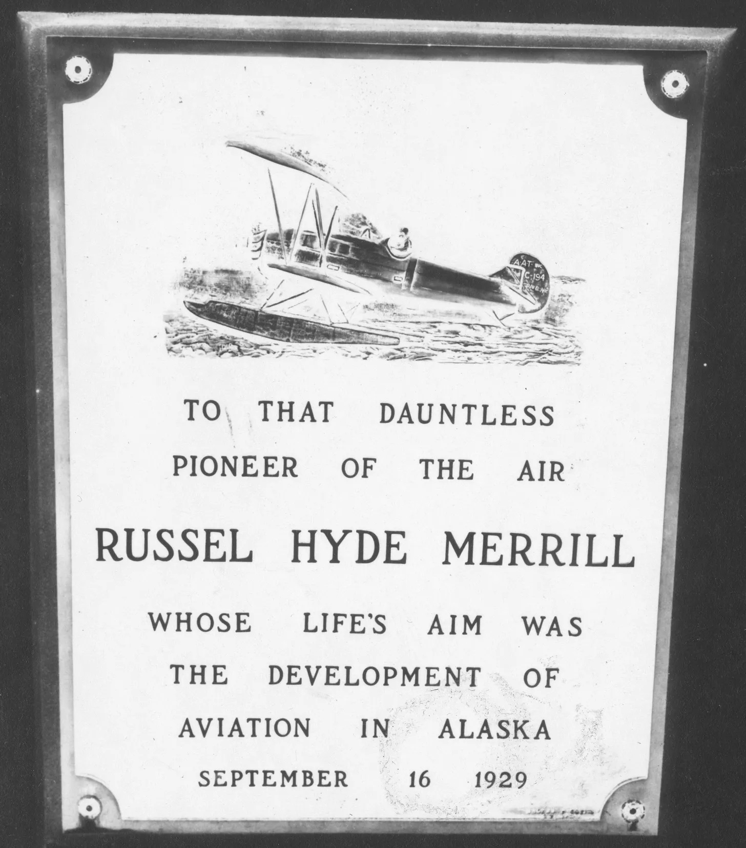 A plaque remembering Russell Merrill.