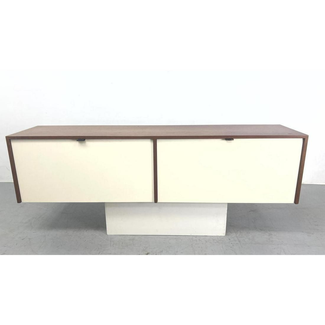 KNOLL American Modern Walnut Wall Hanging Cabinet. Two drop down white doors with leather handles.