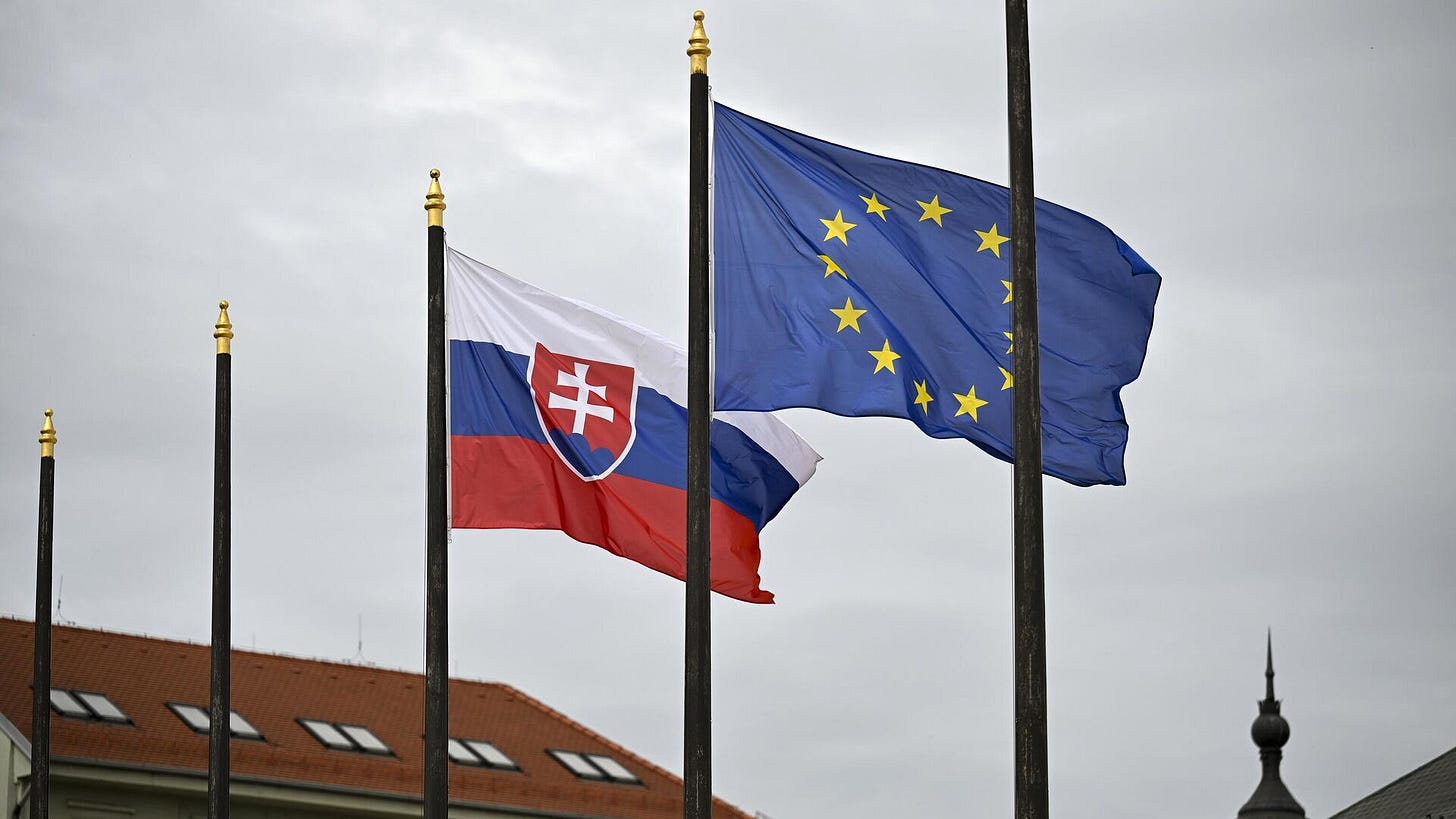 The Slovak national flag, left, flutters next to the flag of European Union in front of the Presidential Palace in Bratislava, Slovakia on Friday, April 5, 2024 - Sputnik International, 1920, 30.12.2024