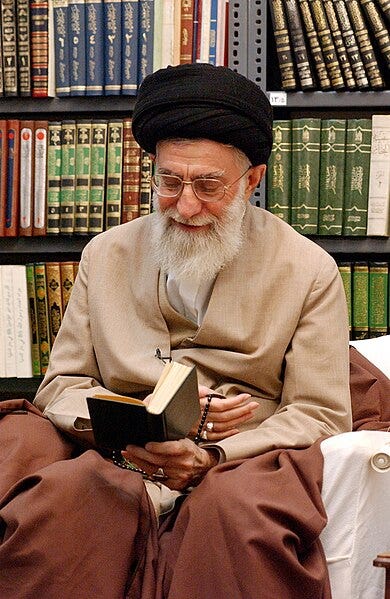 File:Ali Khamenei reading book 04.jpg