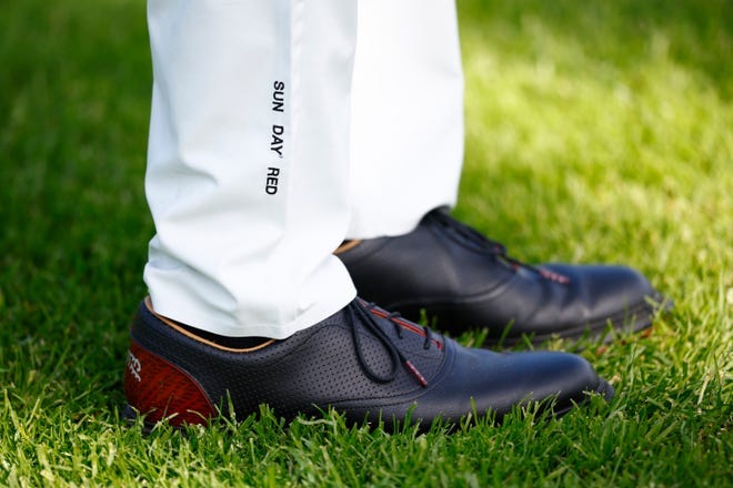 PACIFIC PALISADES, CALIFORNIA - FEBRUARY 13: A shoe detail as Tiger Woods of the United States practices prior to The Genesis Invitational at Riviera Country Club on February 13, 2024 in Pacific Palisades, California. (Photo by Ronald Martinez/Getty Images)