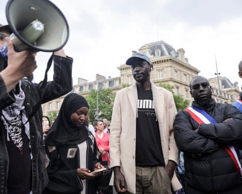 The brother of Aboubakar Cissé, centre, at a rally against Islamophobia, Paris, 27 April 2025.