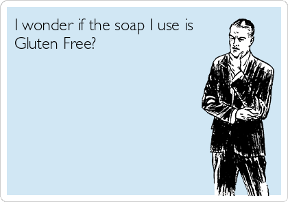 A vintage-style illustration of a man standing and holding his hands together, looking contemplative. The text reads, 'I wonder if the soap I use is Gluten Free?'