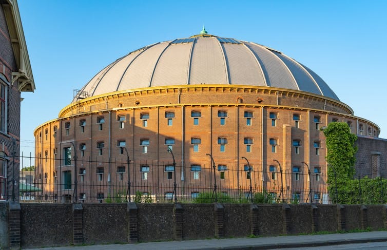 Circular brick building with dome roof. Circular brick building with dome roof.
