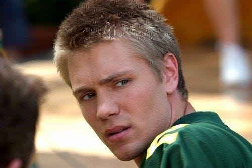 Still from A Cinderella Story, showing Austin Ames looking back over his shoulder at Sam, betrayed.